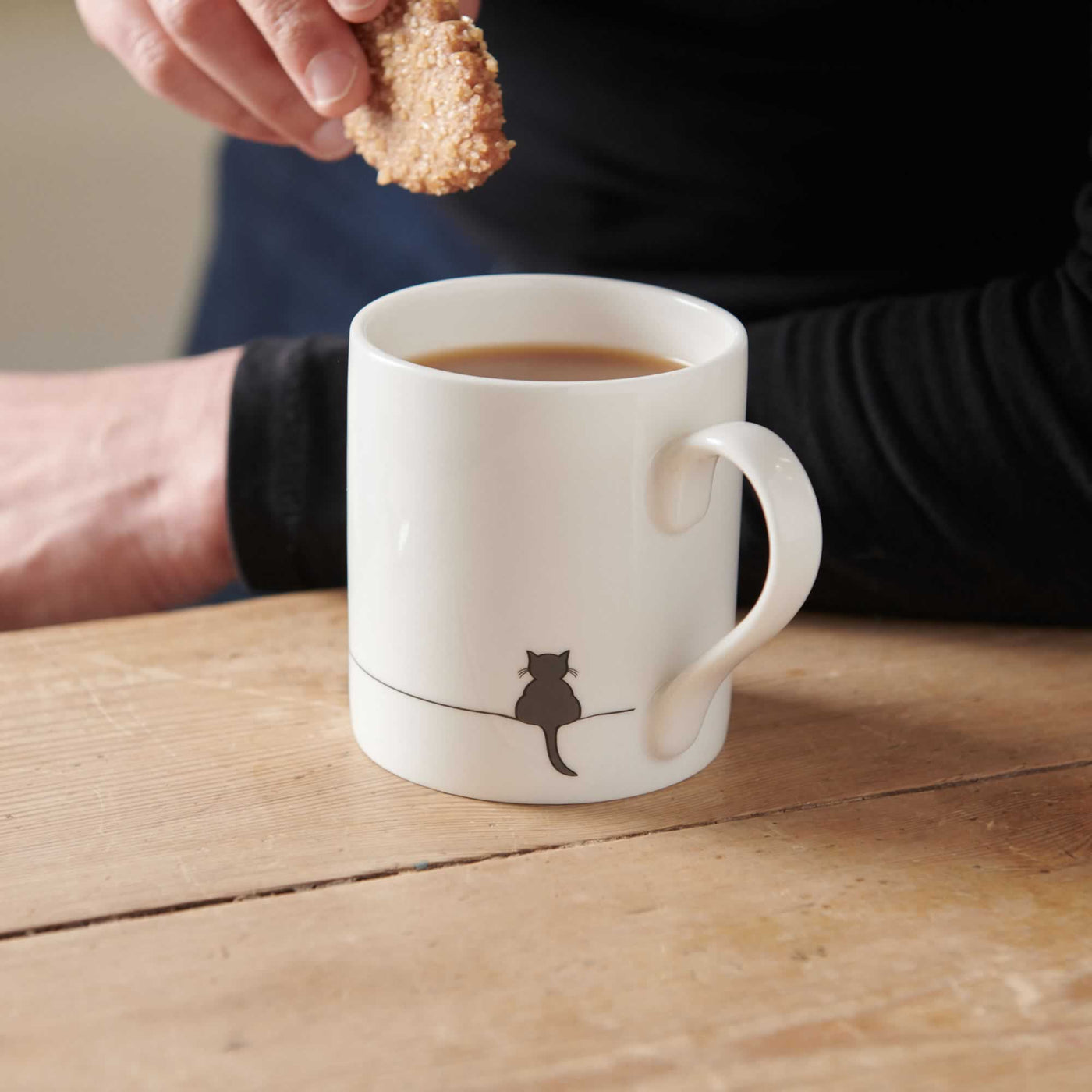 Crouching Cat Mug with biscuit