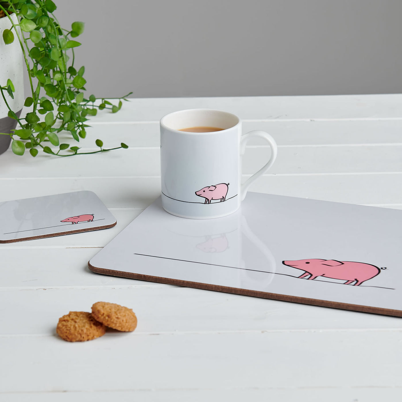 The Pig Collection featuring mug, placemat and coasters
