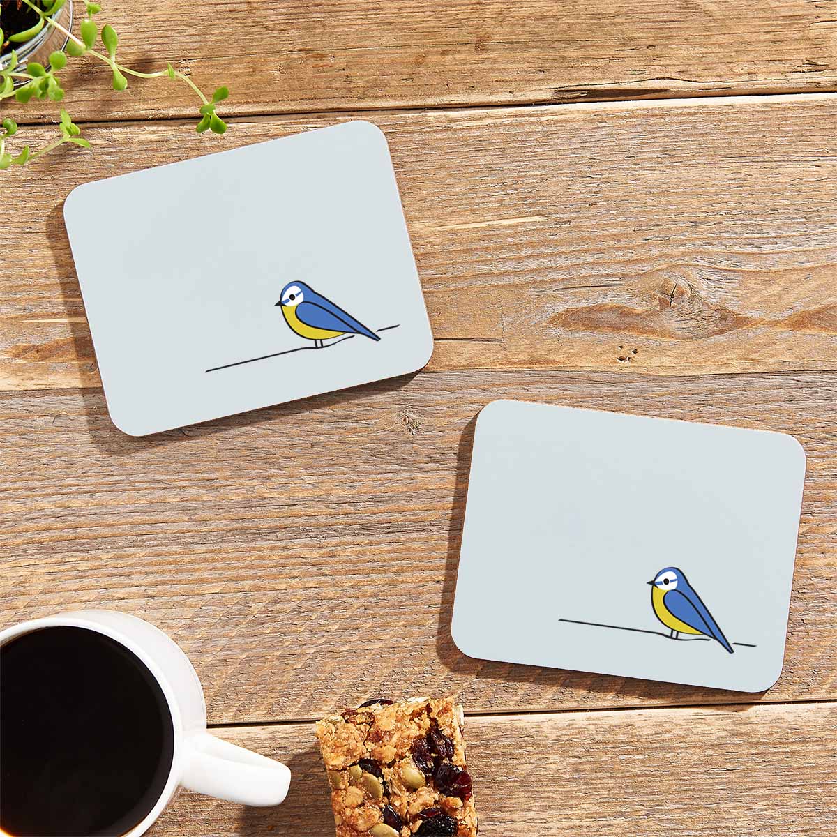 Blue Tit Coasters on table with flapjack