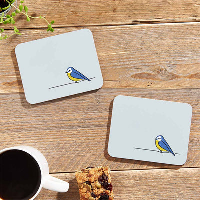 Blue Tit Coasters on table with flapjack