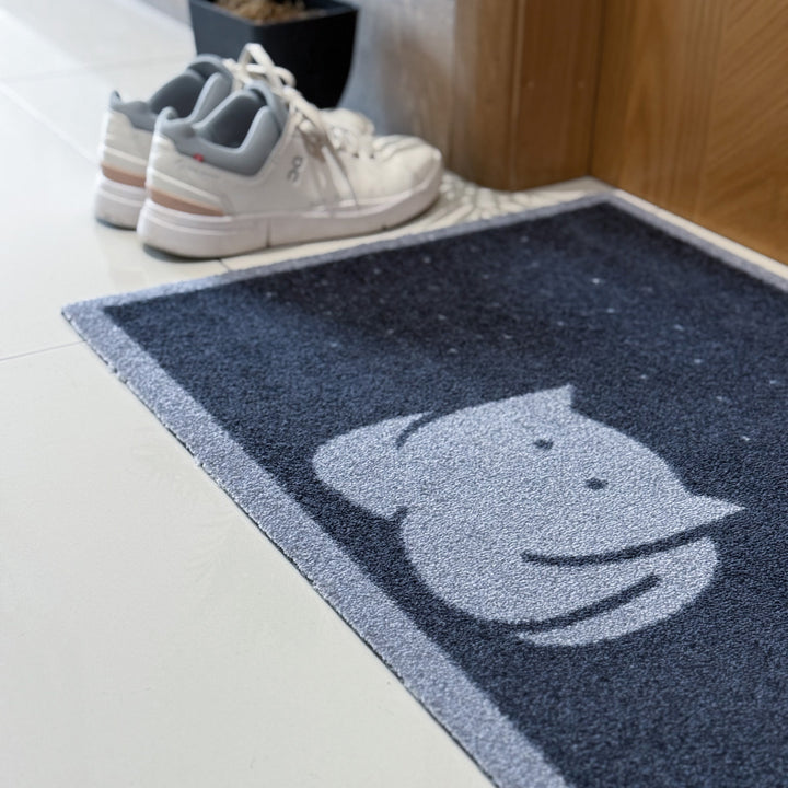 CatLoaf Doormat in hallway close up