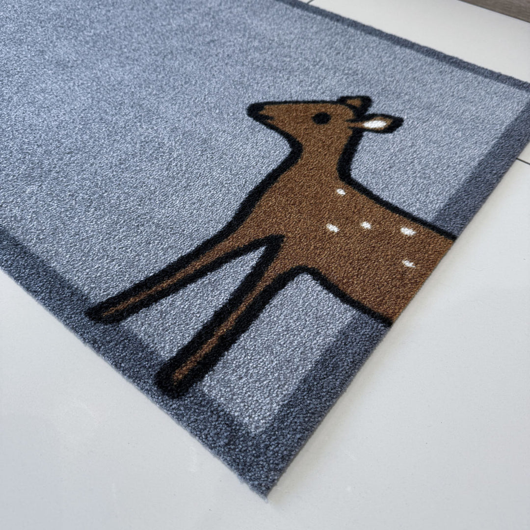 Deer Doormat in hallway close up