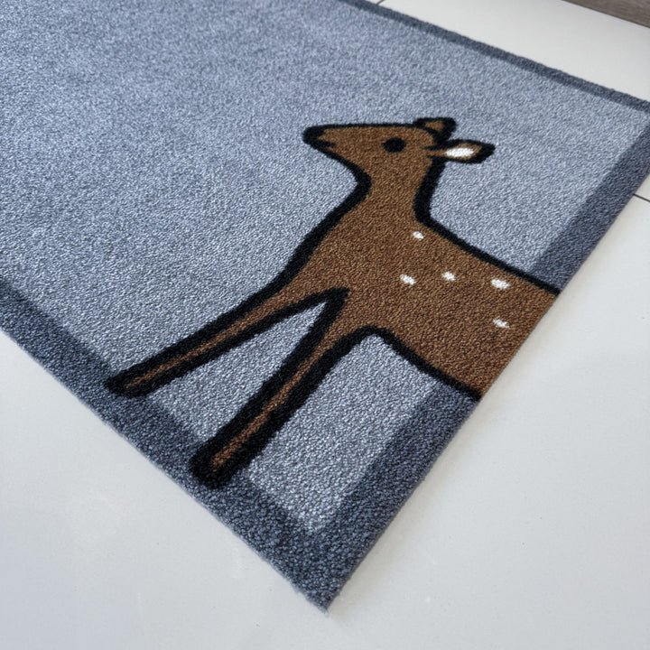 Deer Doormat in hallway close up