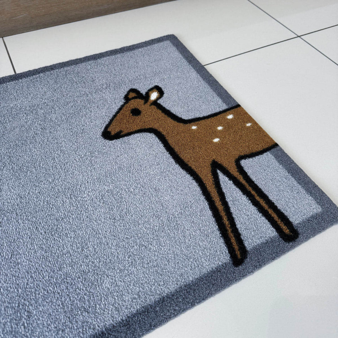 Deer Doormat in hallway close up