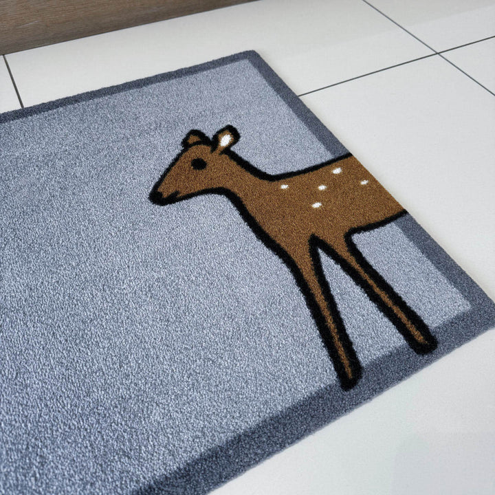 Deer Doormat in hallway close up