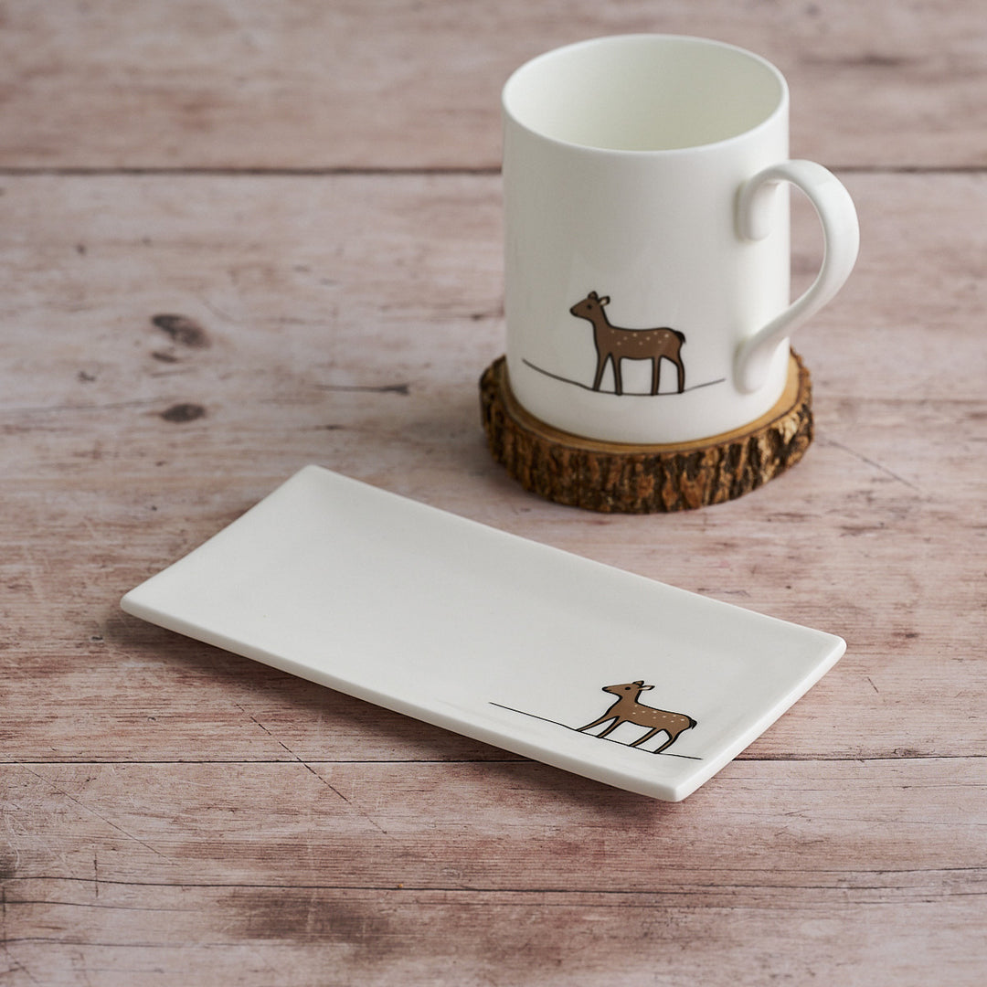 Fine bone china mug and mini tray with Deer on a wooden surface