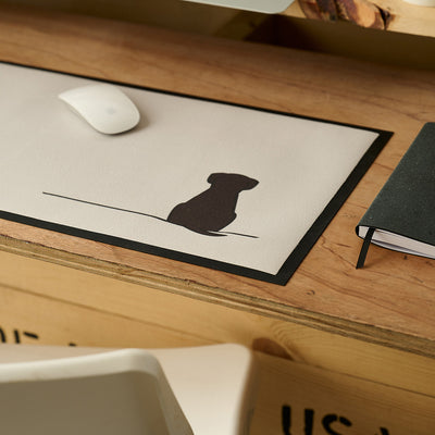 Sitting Dog Desk Mat close up