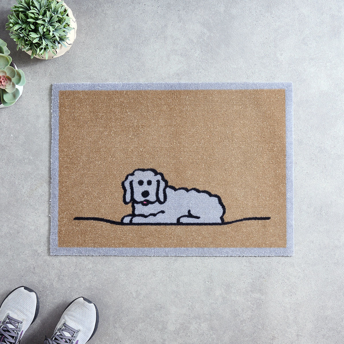 Machine Washable Doormat with a fluffy dog illustration on a grey floor