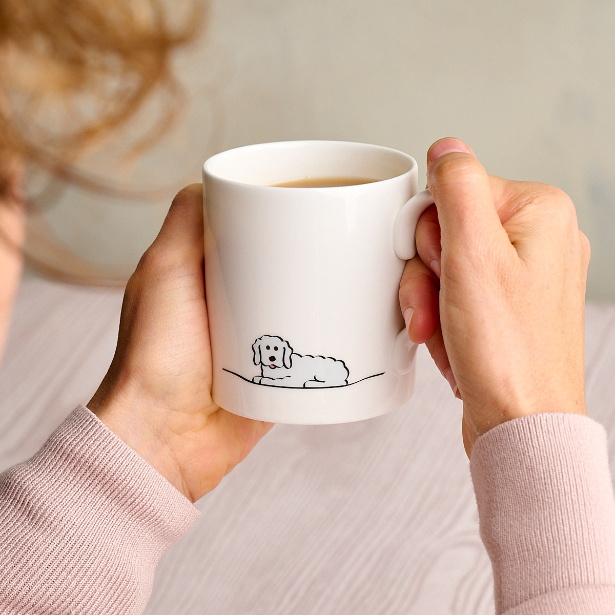 Fluffy Dog Mug in hands