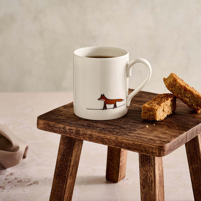 Fox Mug with flapjack on wooden stool