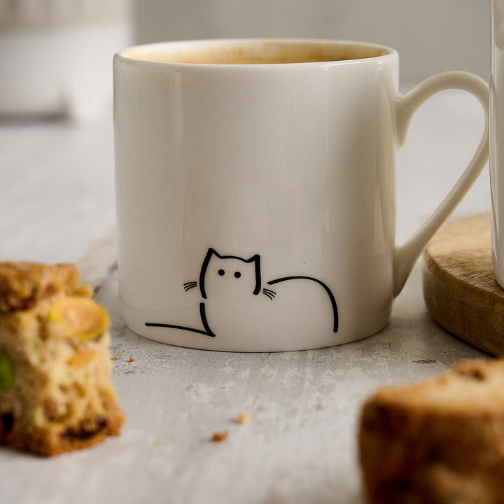 Cat Espresso Mugs, Set of Two with Loafing Cat and biscotti