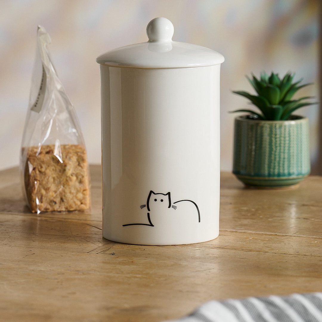 Loafing Cat Storage Jar with pack of biscuits