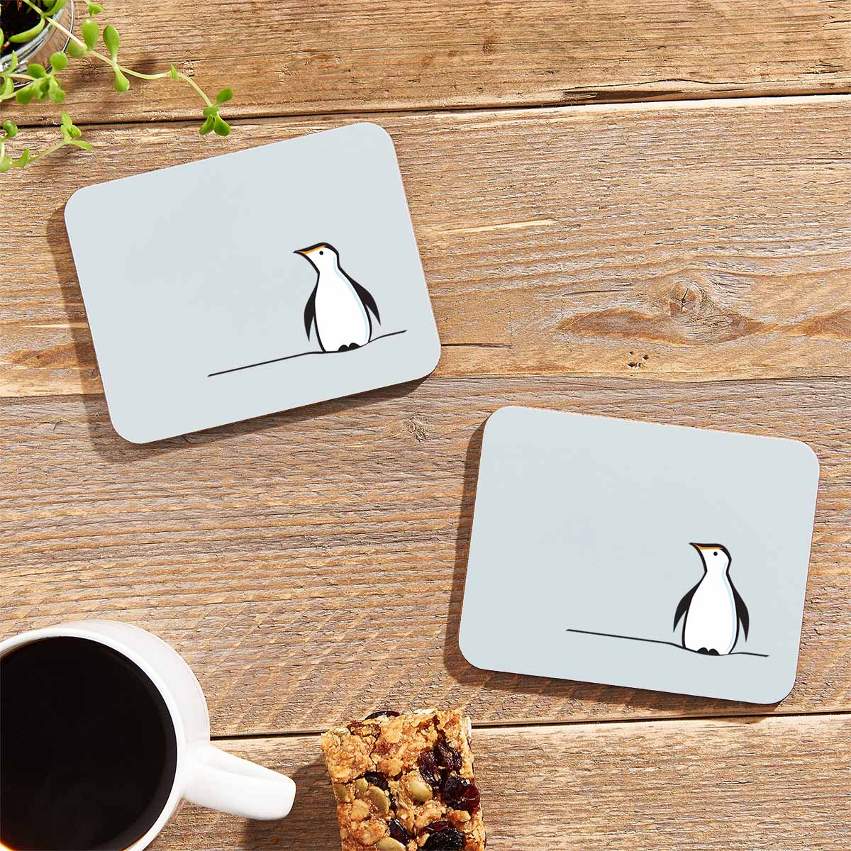 Penguin Coasters on table with flapjack