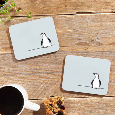Penguin Coasters on table with flapjack