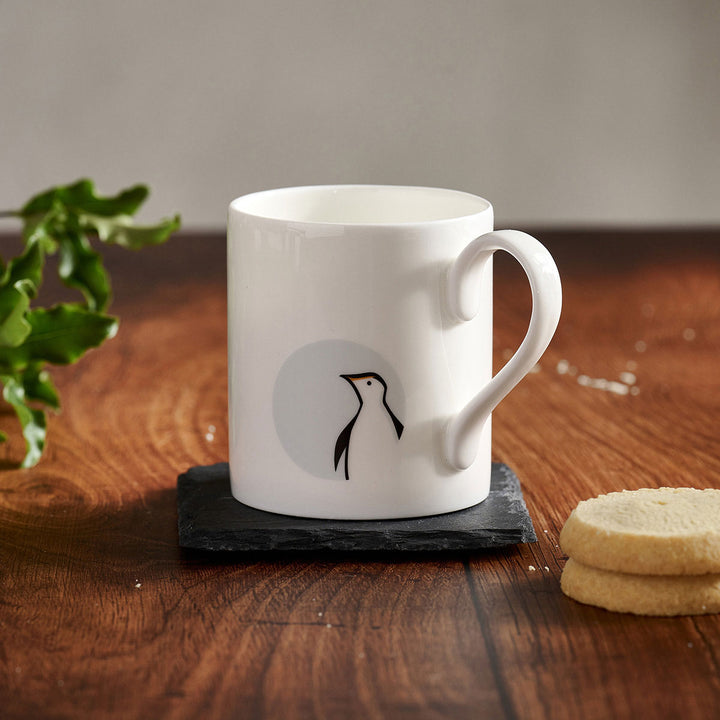 Penguin Mug with Biscuits