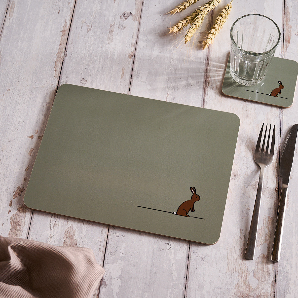 Rabbit Placemat on table with Rabbit Coaster and cutlery