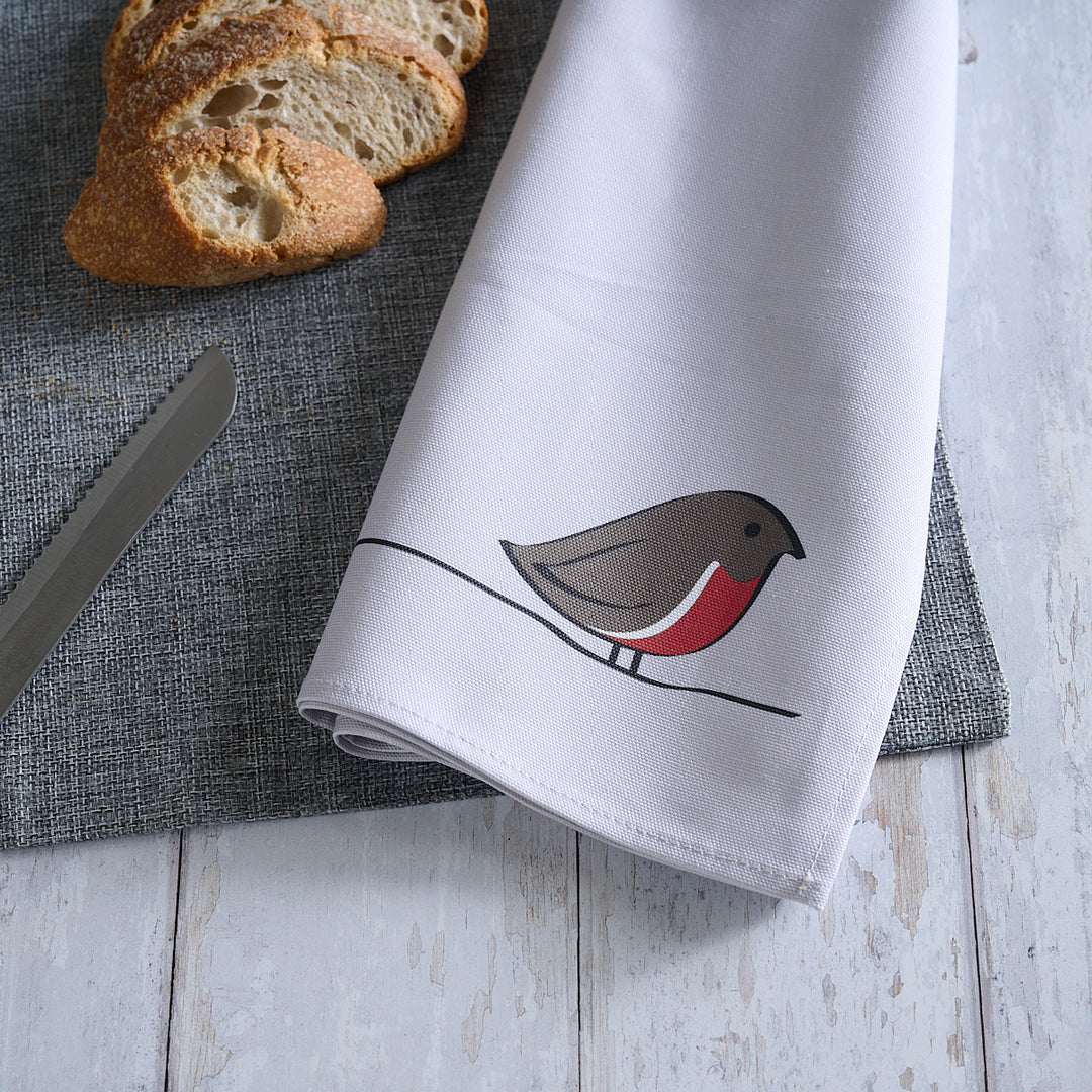 Robin Tea Towel on table