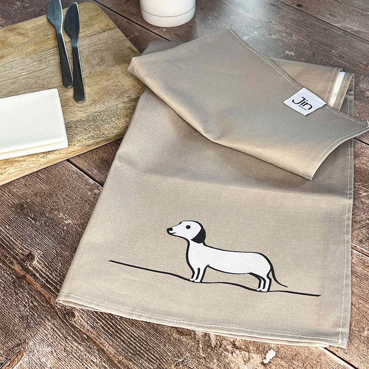 Sausage Dog Tea Towel on table