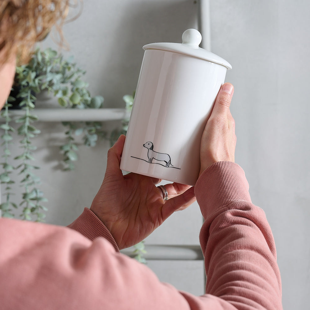 Sausage Dog Storage Jar in hands