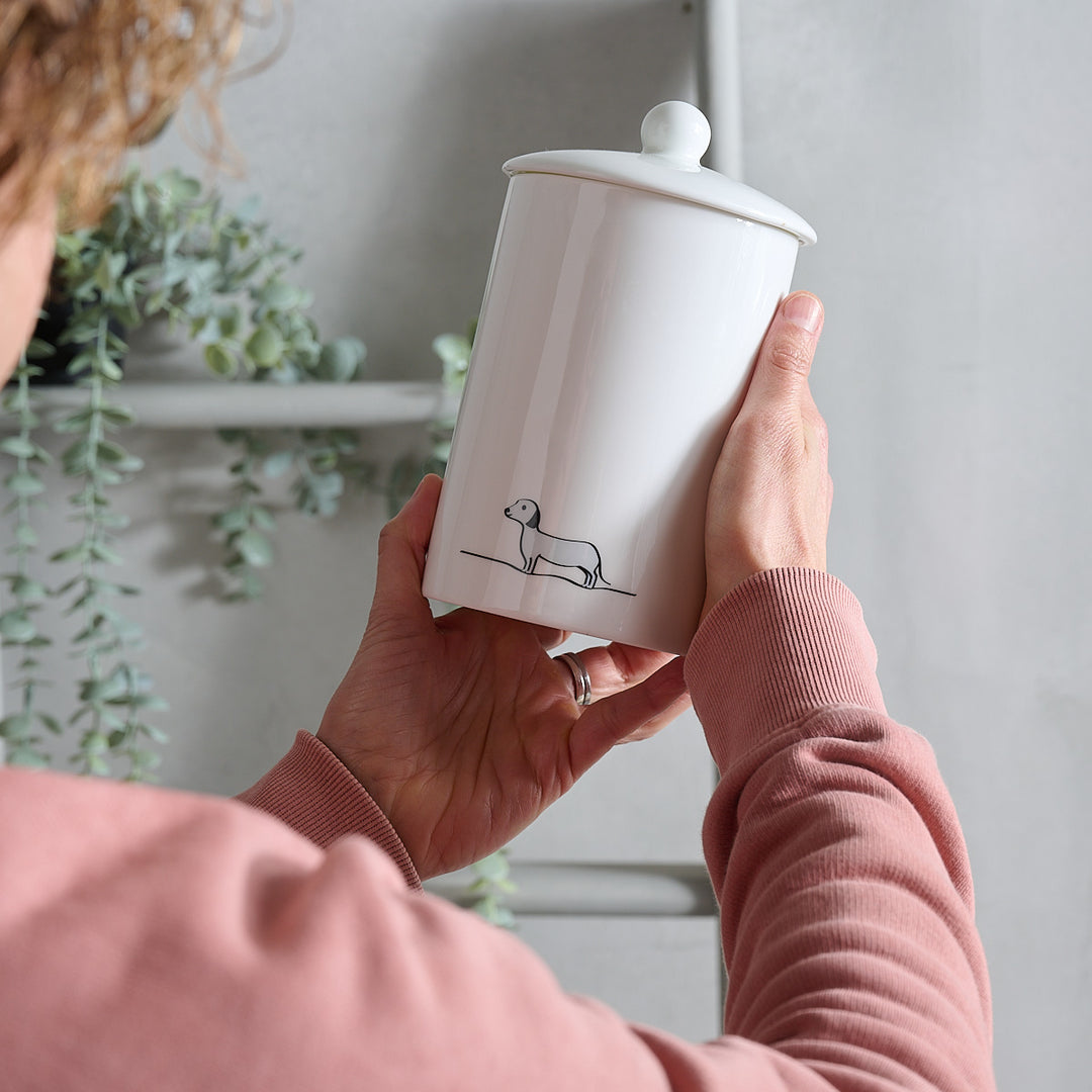 Sausage Dog Storage Jar in hands