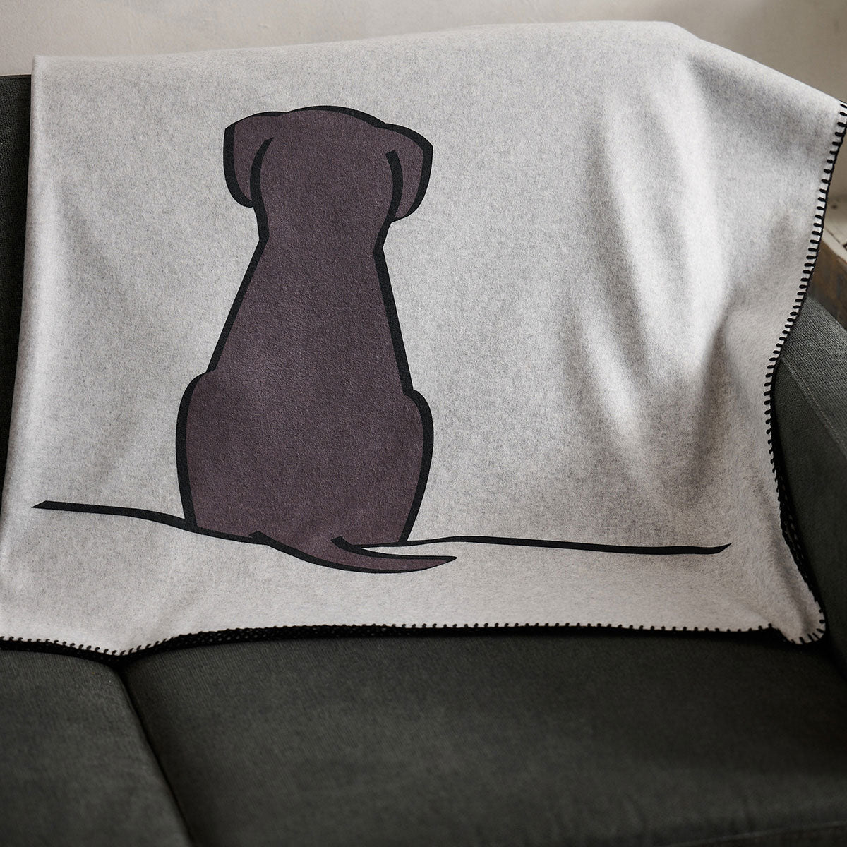 Sitting Dog Fleece Blanket on sofa