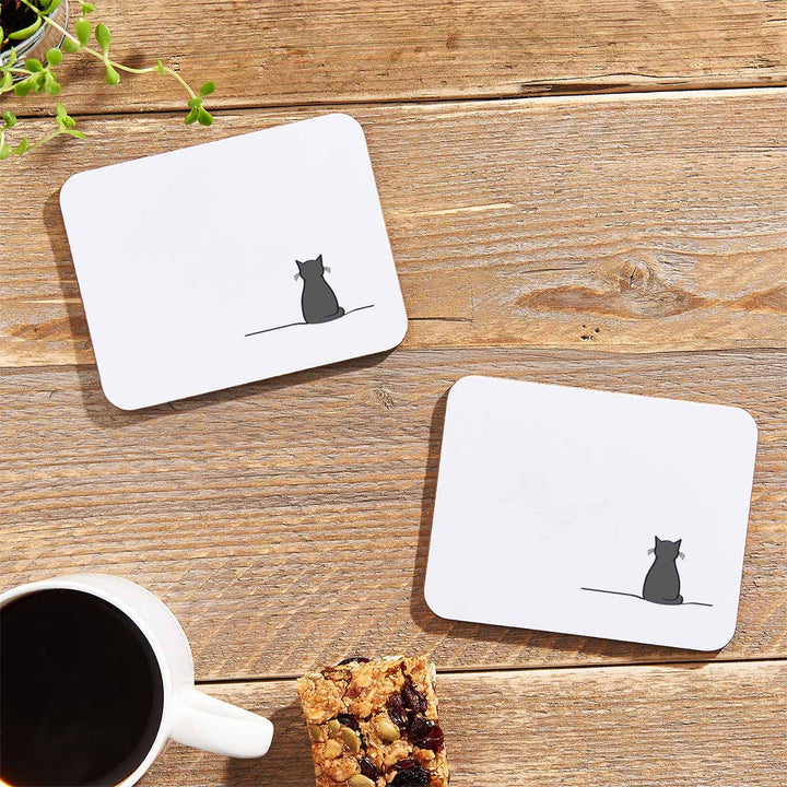 Sitting Cat Coasters on table with flapjack
