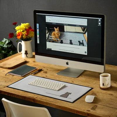 Sitting Cat Desk Mat with mug and jug