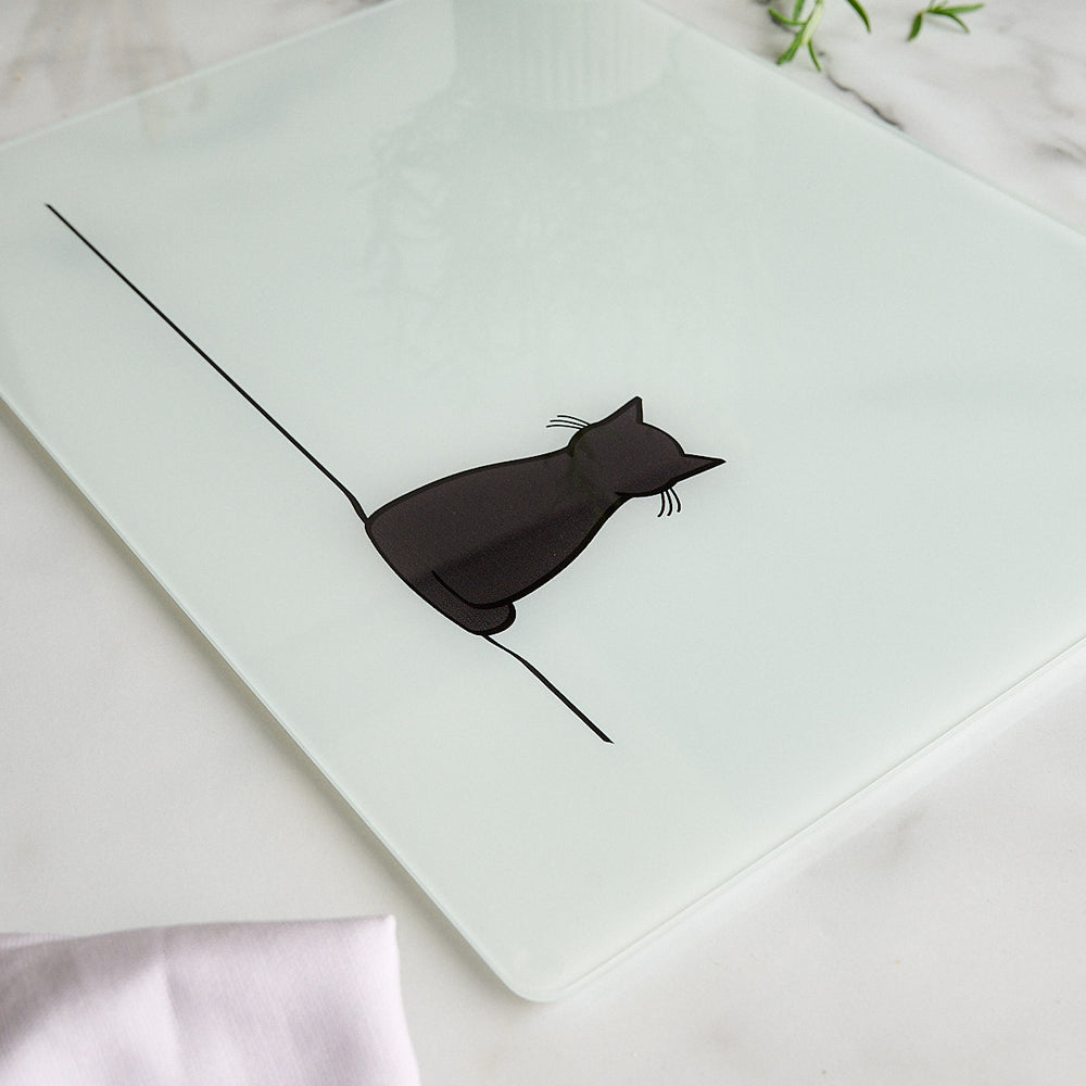 Sitting Cat Glass Worktop Saver on marble surface