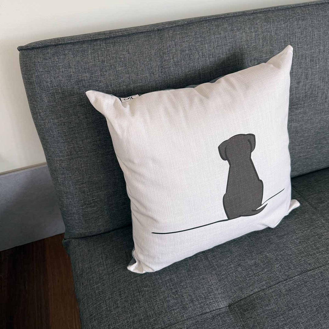 Sitting Dog Cushion on sofa