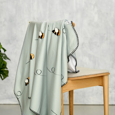 Bee Blanket draped over chair