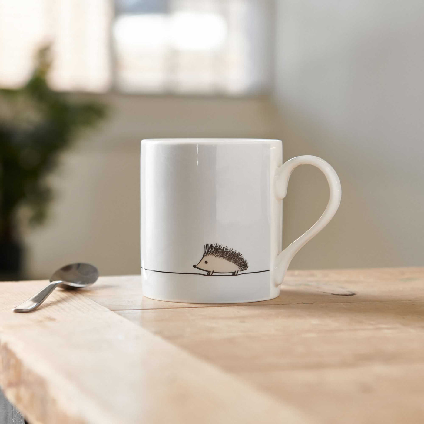 Hedgehog Mug on table