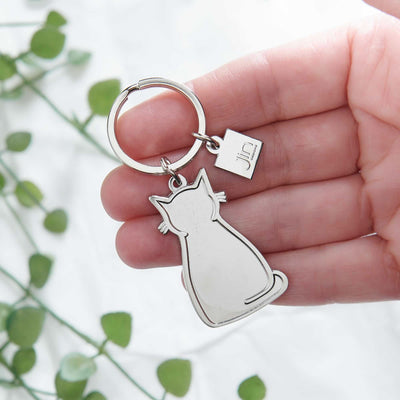 Sitting Cat Silver Keyring in hand