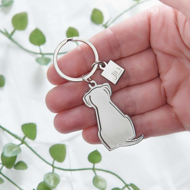Sitting Dog Silver Keyring in hand
