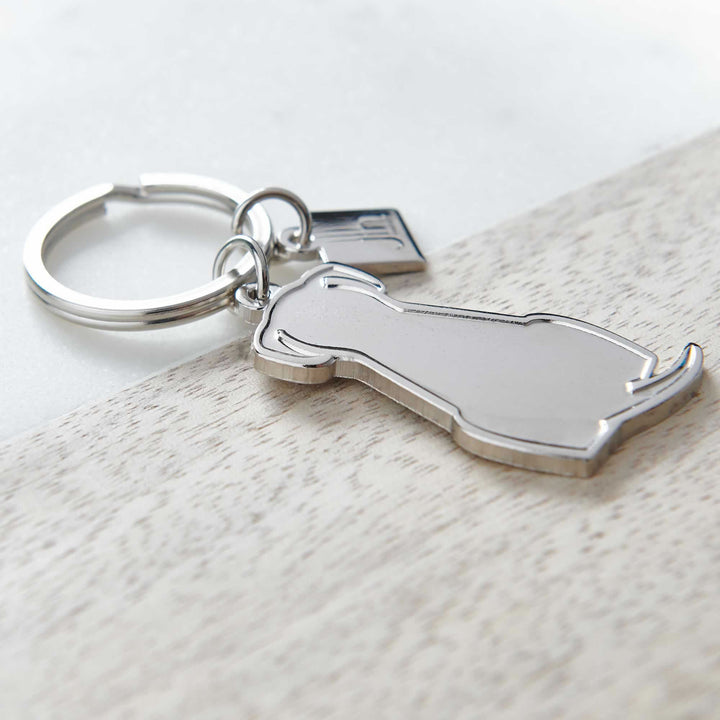 Sitting Dog Silver Keyring Close up