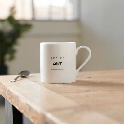 Cup of Love Mug on table