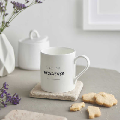 Cup of Resilience Mug with biscuits