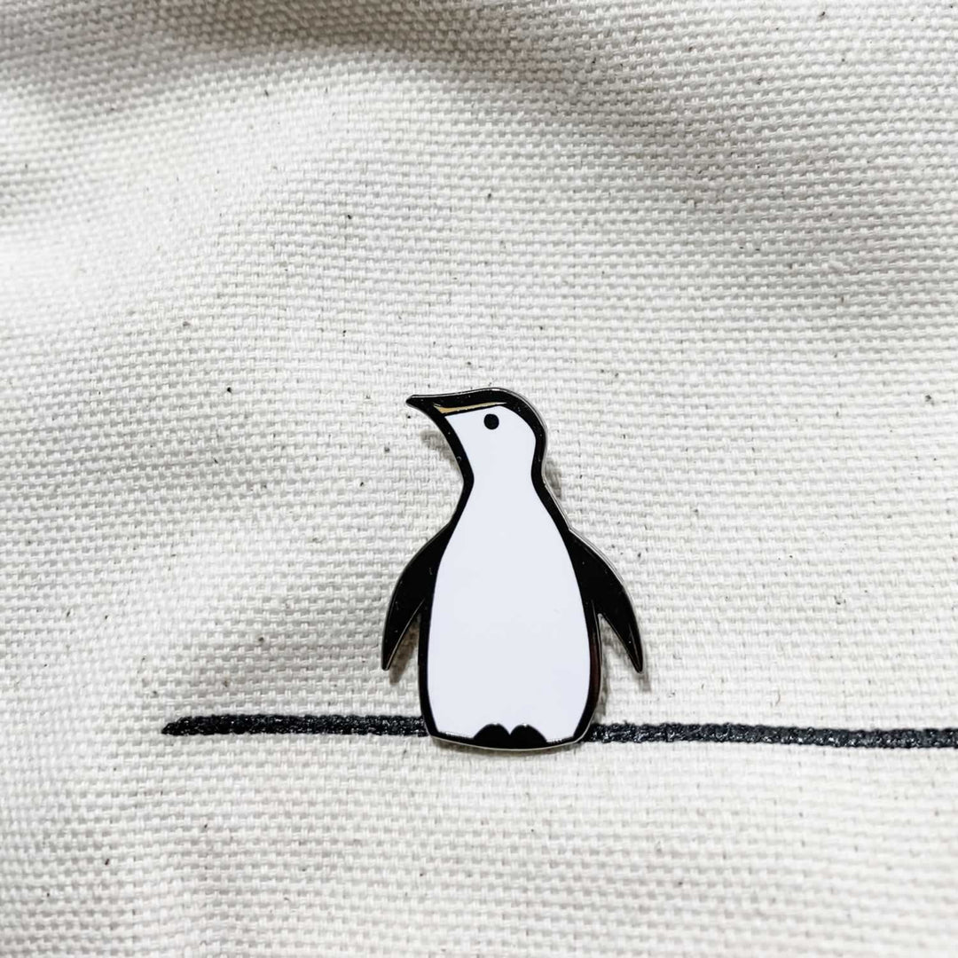 Penguin Enamel Pin on Material