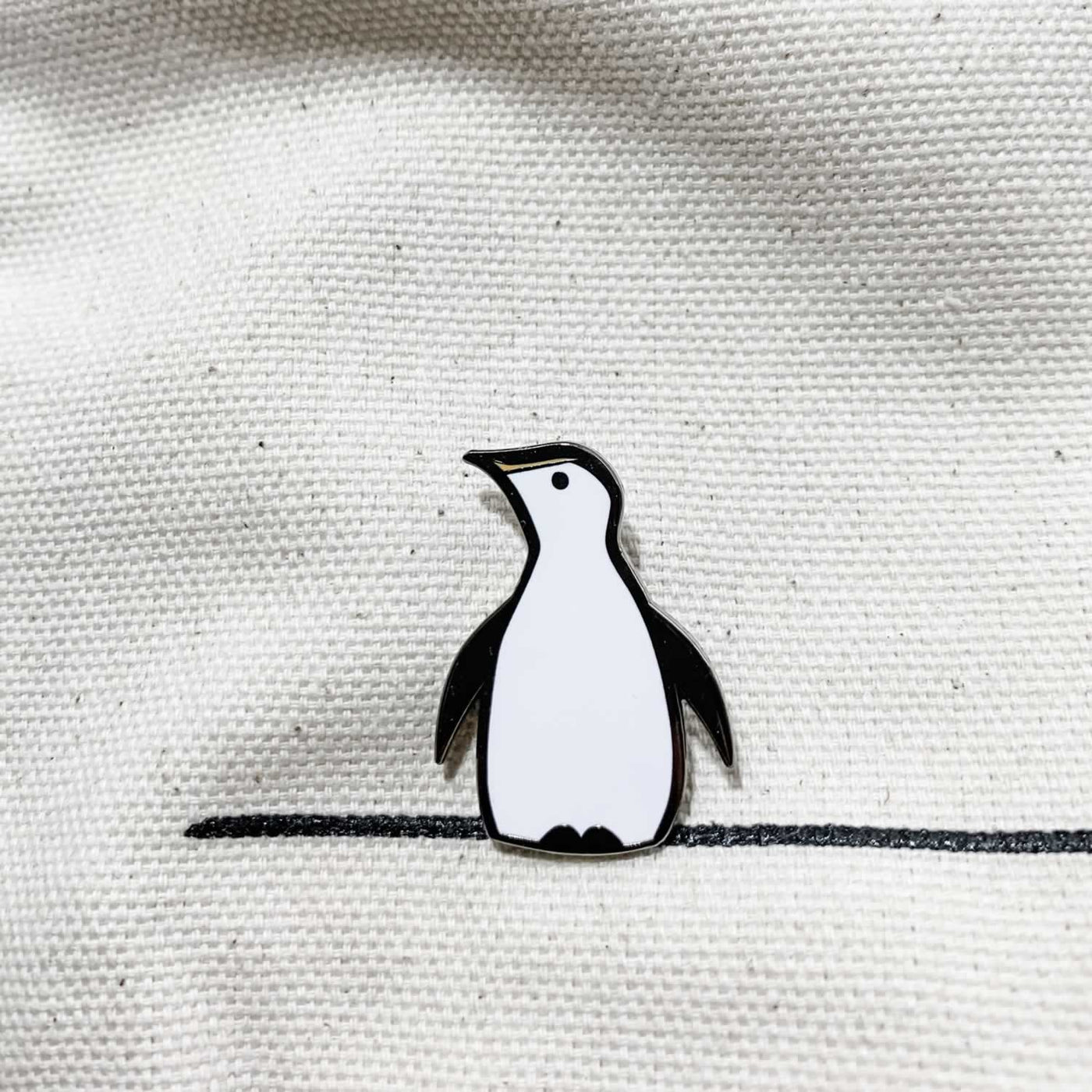 Penguin Enamel Pin on Material