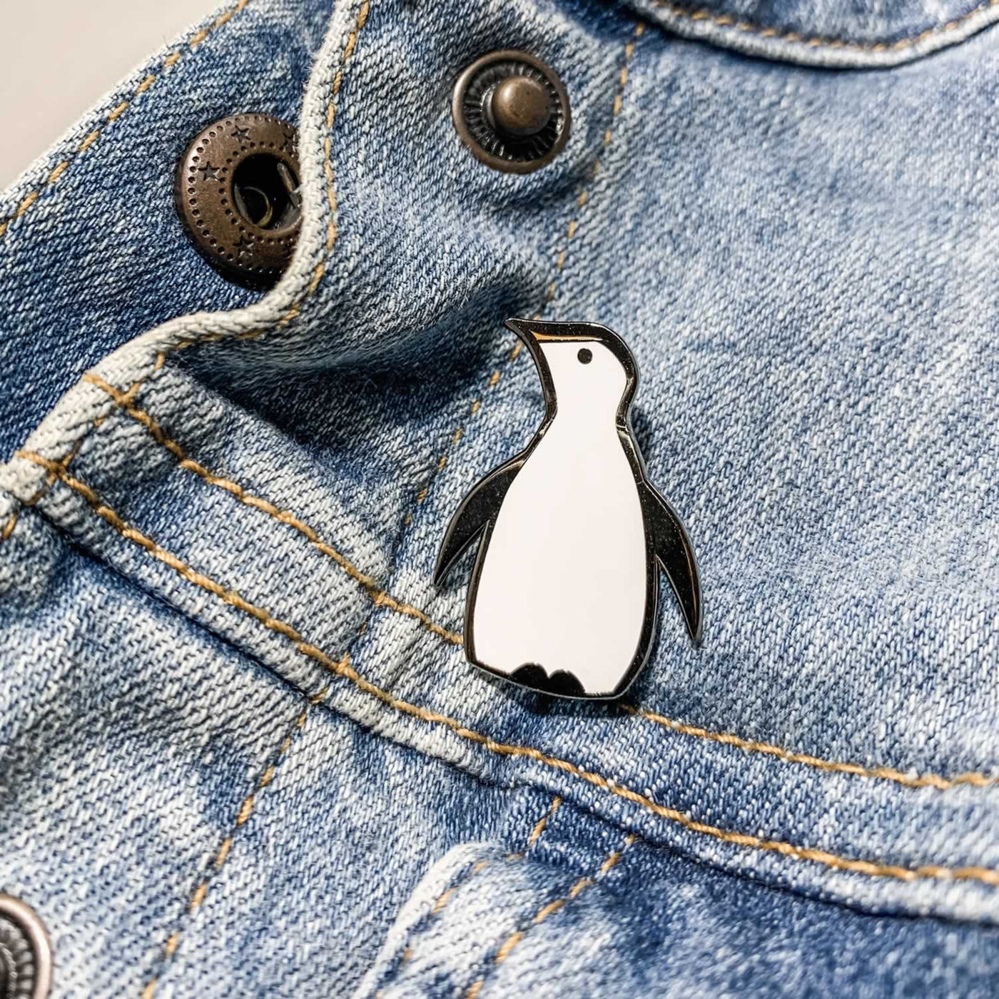 Penguin Enamel Pin on Denim