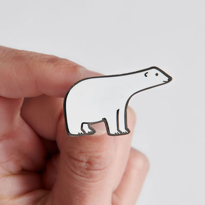 Polar Bear Enamel Pin in hand
